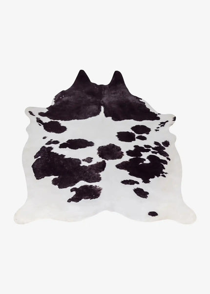 Fejkad kohud ger samma rustika känsla som äkta, men är djurvänlig och lättskött. En dekorativ matta som blir ett unikt inslag i ditt hem.